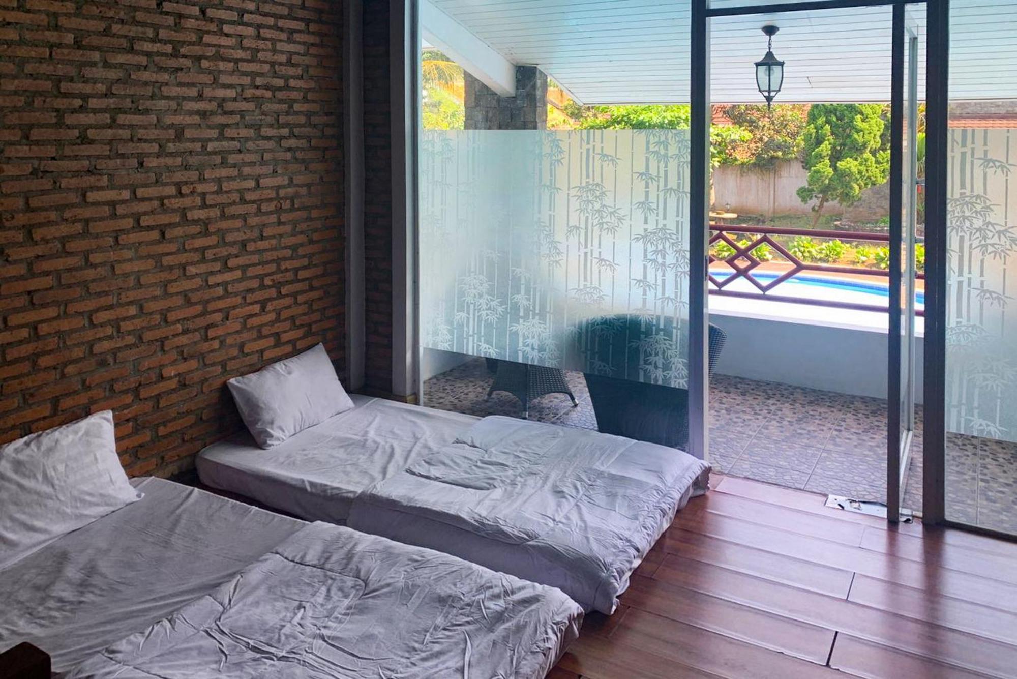 Urbanview Hotel Villa Q Gisting Bandjarnegeri Esterno foto